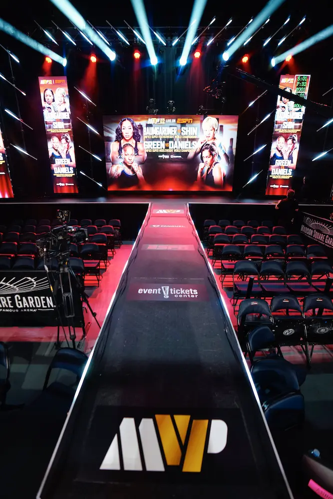 Event Tickets Center logo on the runway to a stage with a podium