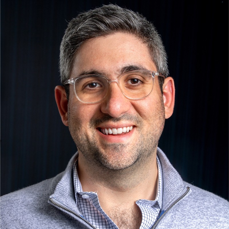 Ben Kruger, The CMO of Event Tickets Center, posing for a professional photo.