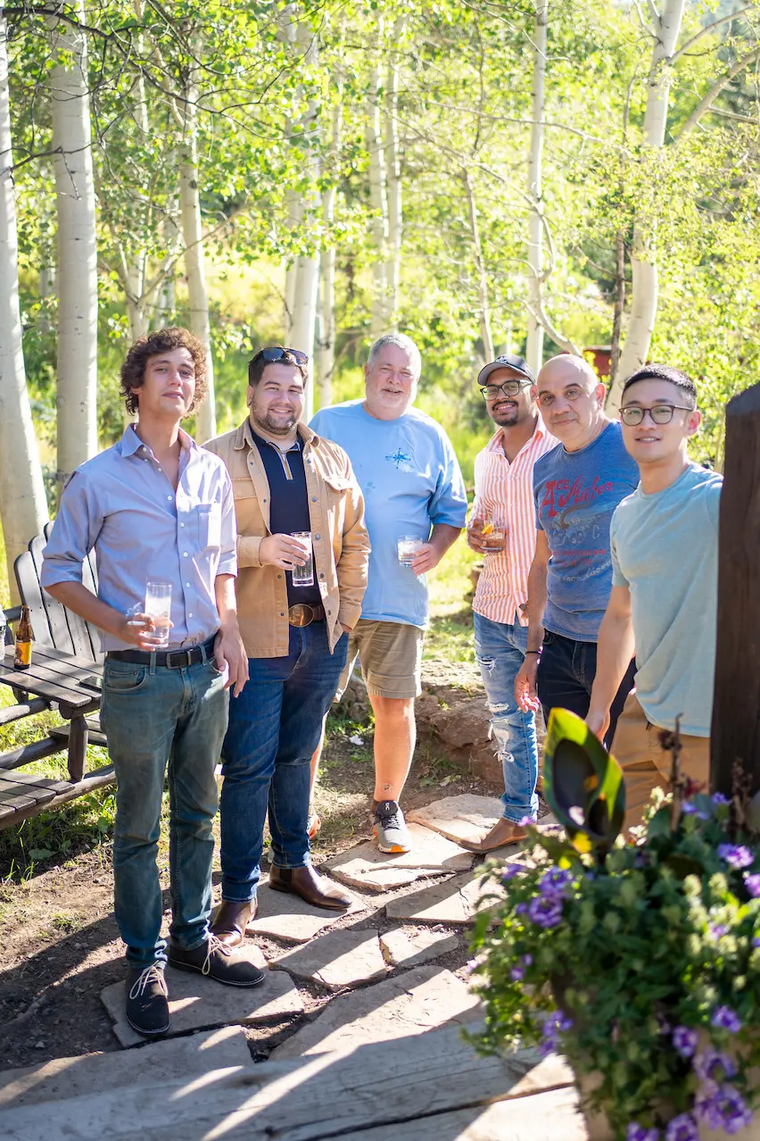 ETC Team members standing in a circle in the outdoors conversing